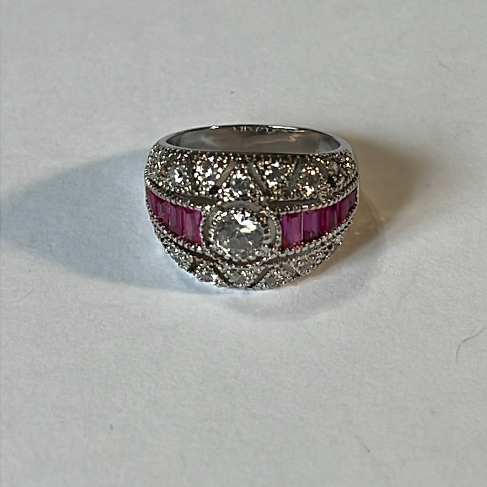 Sterling silver ruby and artificial Diamond ring.